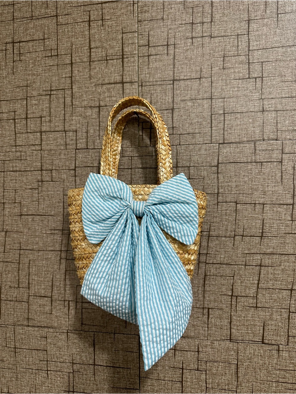 Woven Straw Tote with Blue Bow Accent
